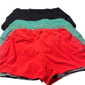 Set of Three Athleta running Shorts - Orange Teal and Black Bundle size large
